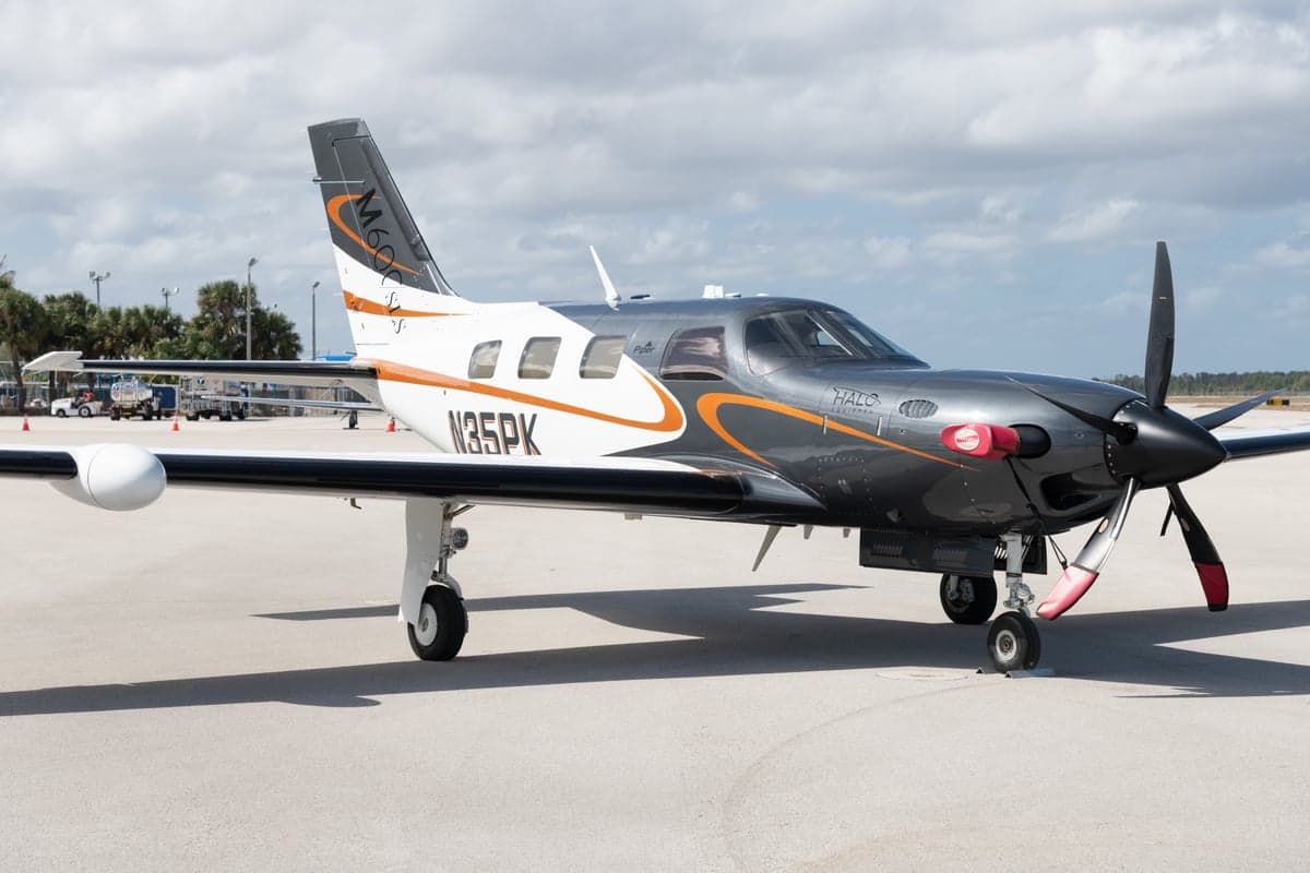 A Piper M600 HALO, registration N35PK, is parked on the tarmac.