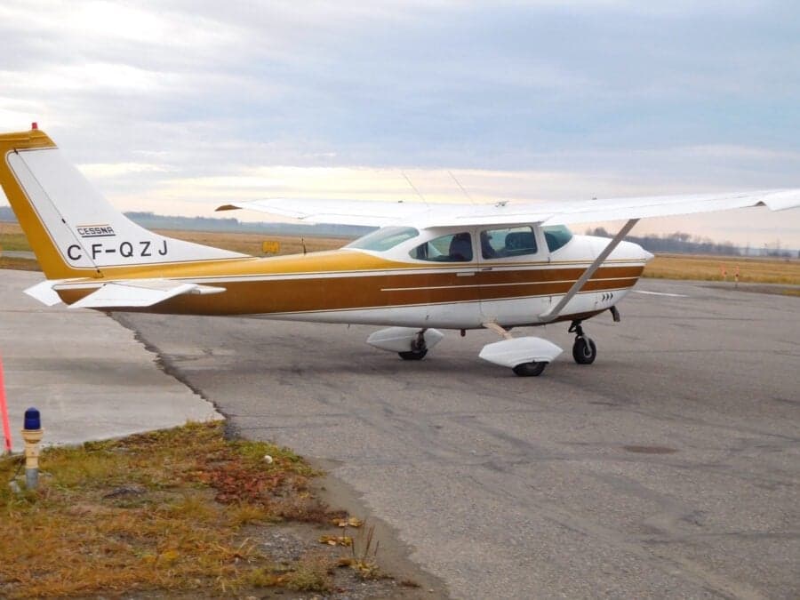 Cessna 182 Skylane parked on the tarmac.