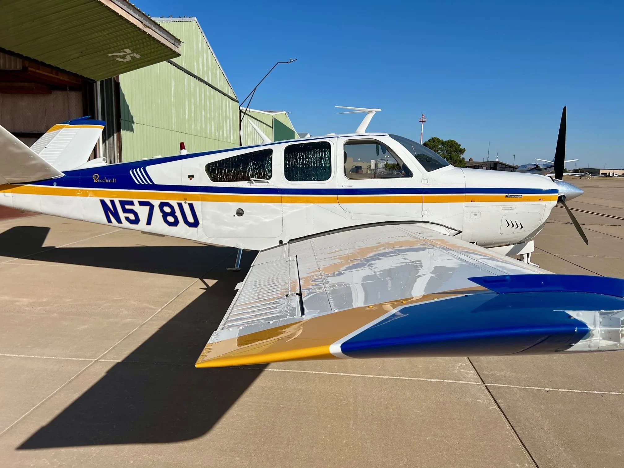 Side profile of the N578U aircraft showing the paint scheme and registration number.