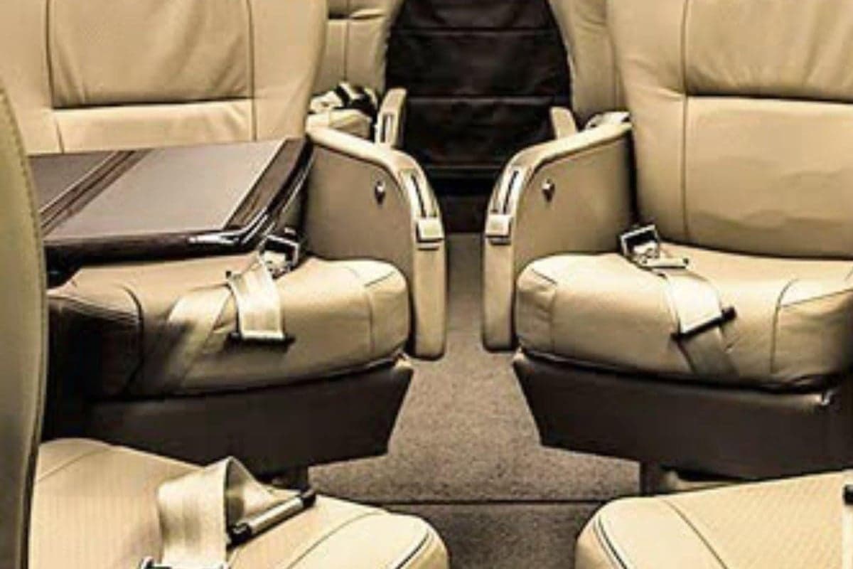 Close-up of the aircraft's leather seats and tray tables.