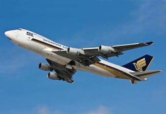 A Singapore Airlines Boeing 747 taking off.