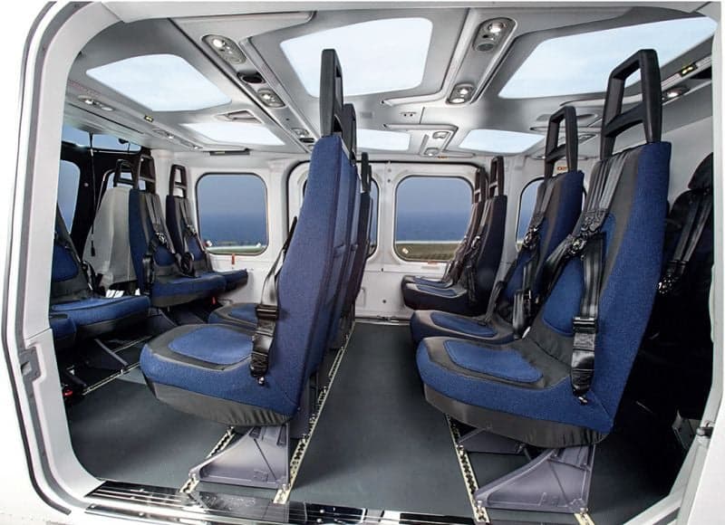 Overhead diagram of an aircraft interior layout with seating.