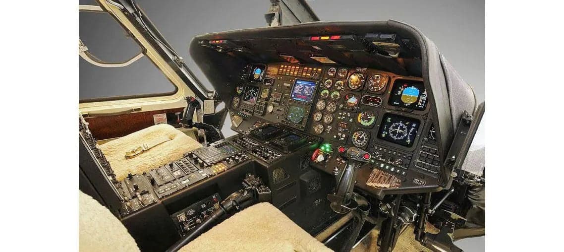 The helicopter's cockpit is equipped with a full suite of avionics and displays.