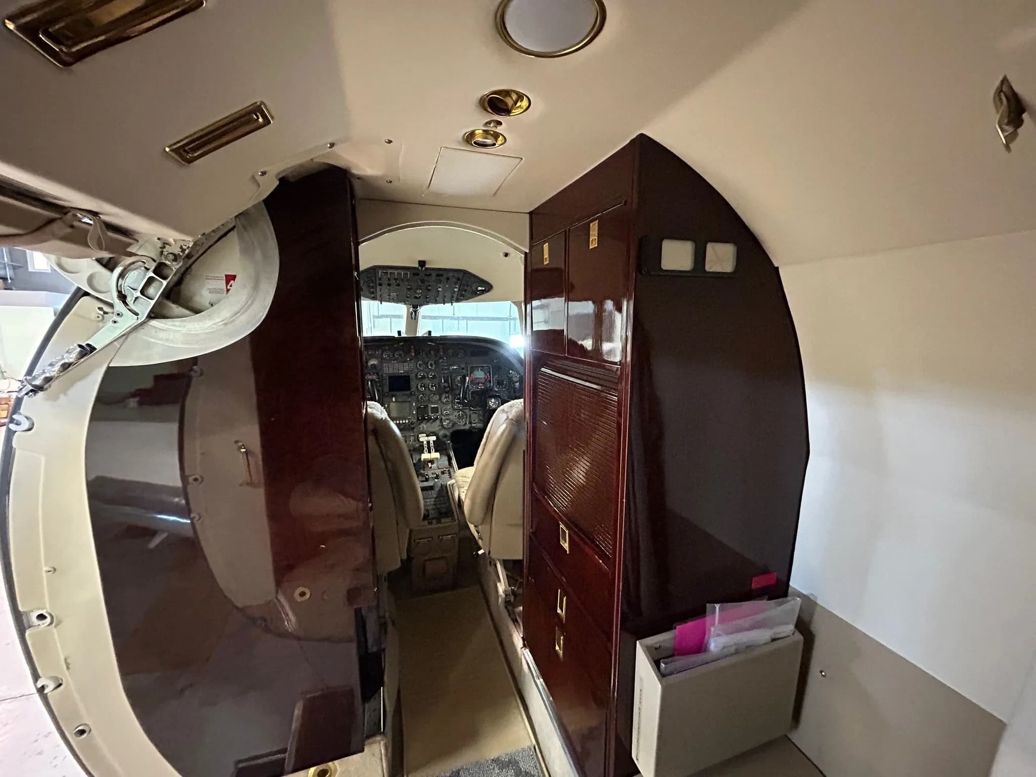 View of the aircraft interior cabinet and cockpit.