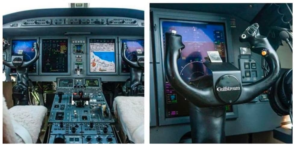 The cockpit of a jet aircraft with multiple screens and controls.