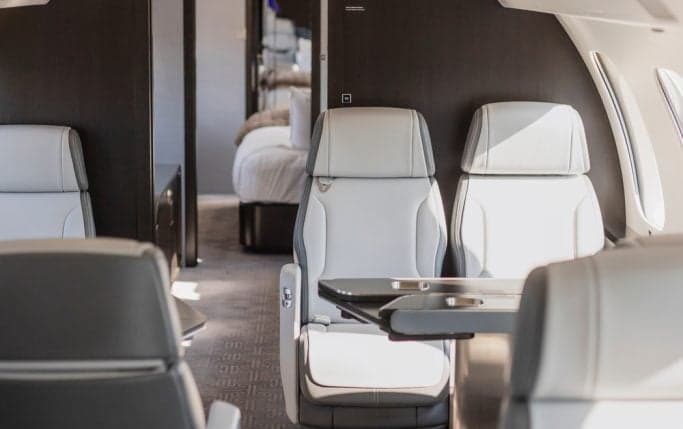 Close-up of the leather seats and table in the Global 7500 cabin.