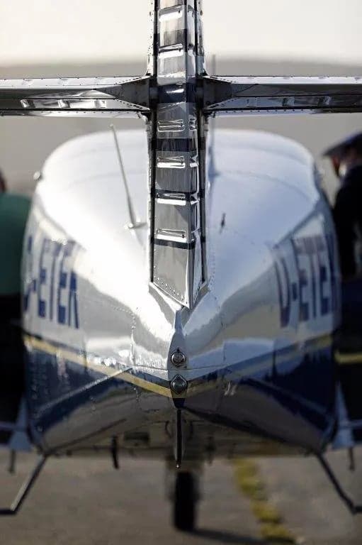D-ETEK aircraft in flight, rear view.