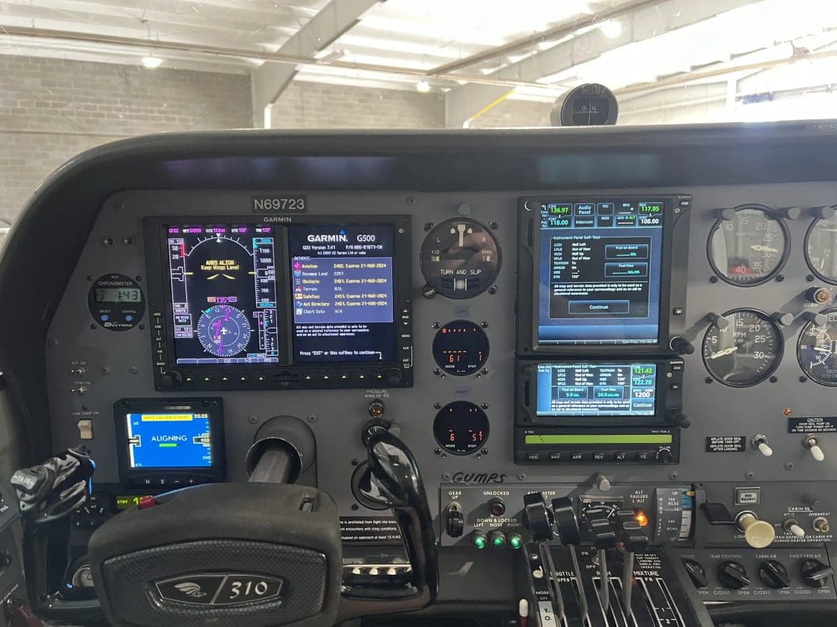 Full view of the cockpit with Garmin avionics and tail number N69723.
