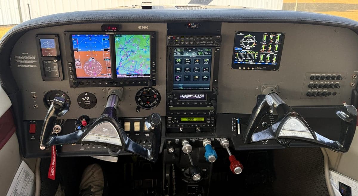The cockpit of the N71002 aircraft features a modern avionics suite.