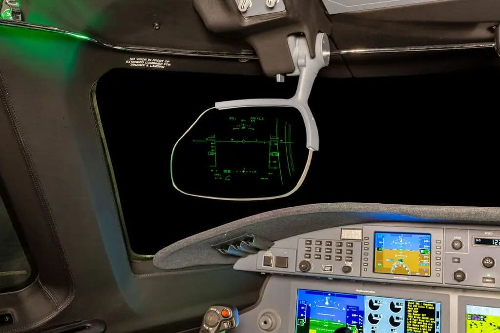 Heads-up display and instrument panel in the cockpit of a Gulfstream jet.