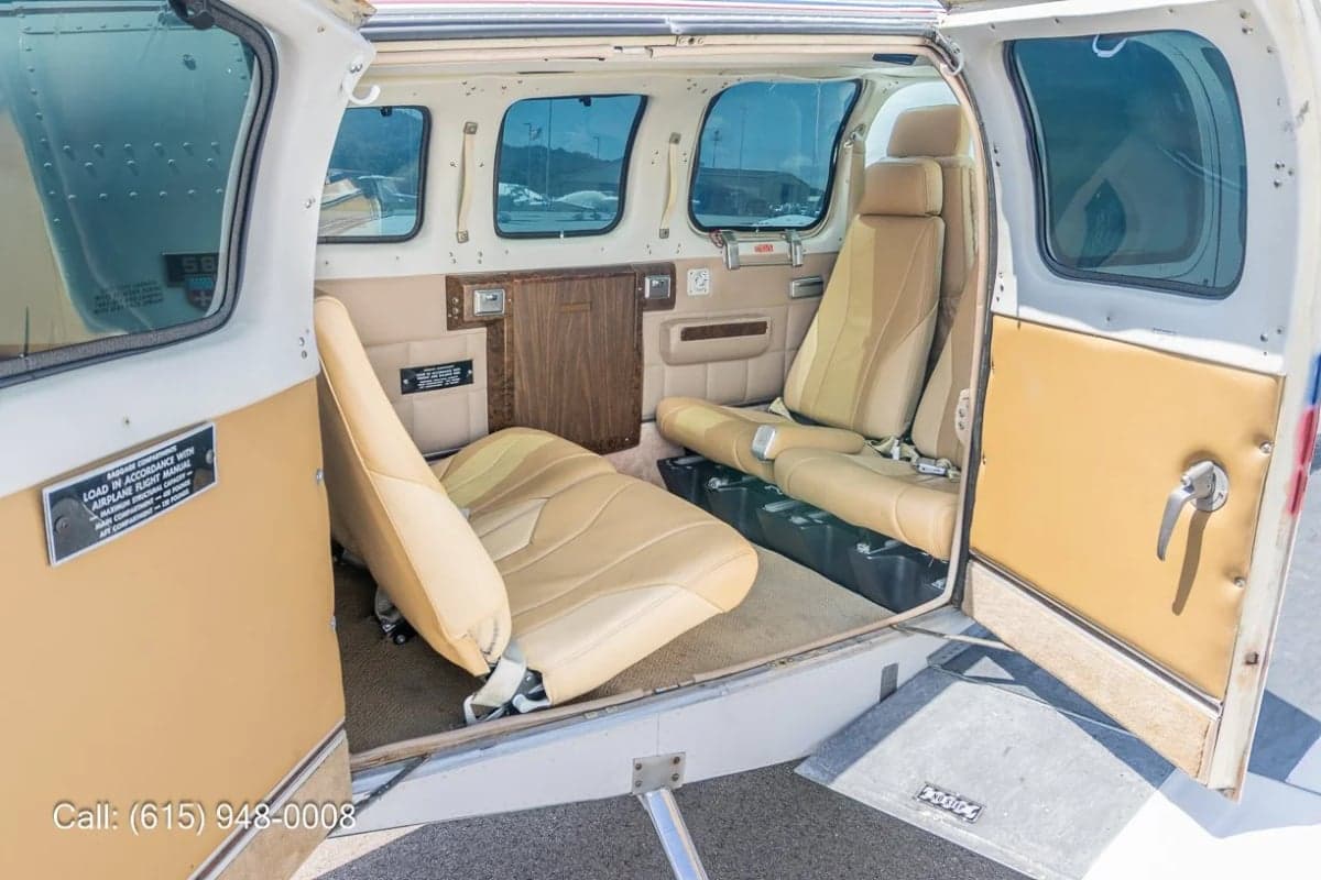 View of the interior of a Beechcraft Baron with the door open.