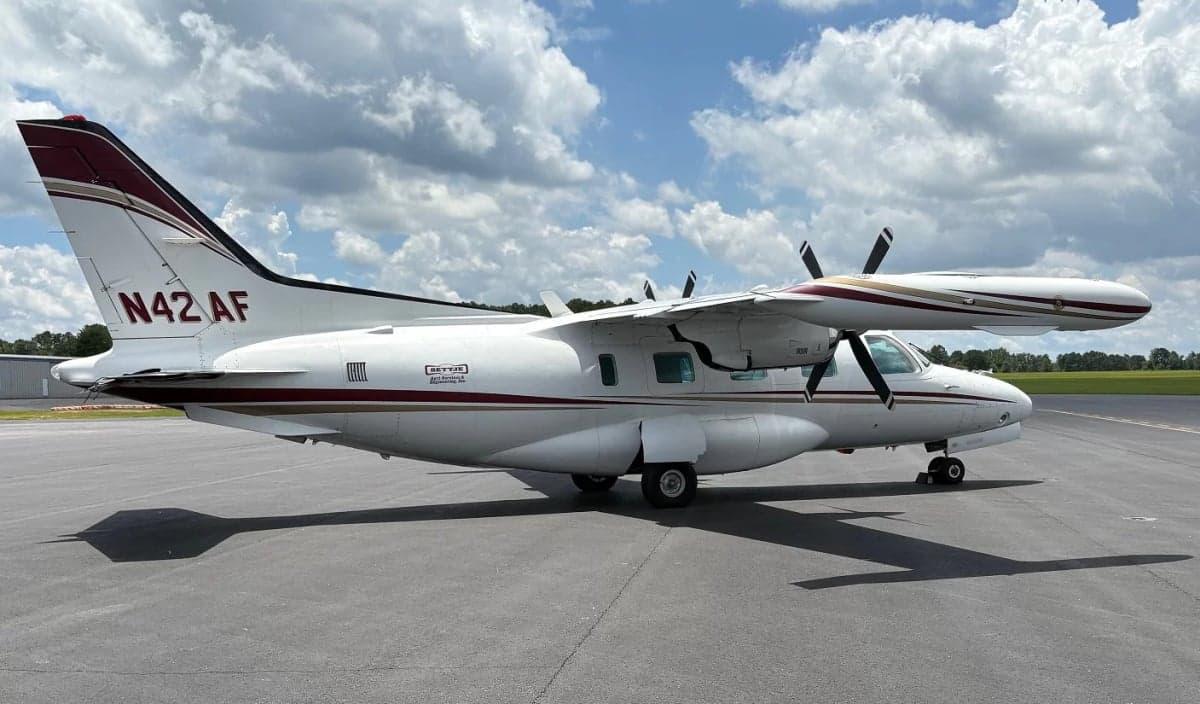 Side view of the aircraft N42AF on the tarmac.