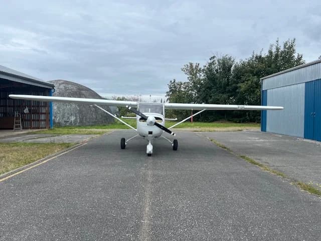 Front view of the C-FZCE Cessna aircraft on the tarmac.