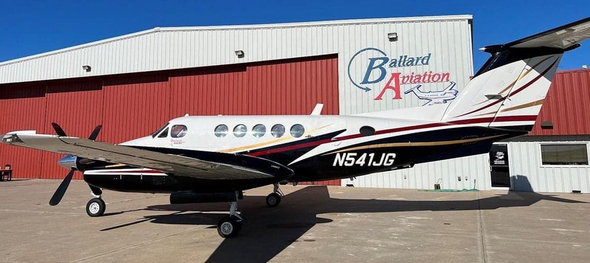 Beechcraft King Air N541JG parked on the tarmac in front of a hangar.