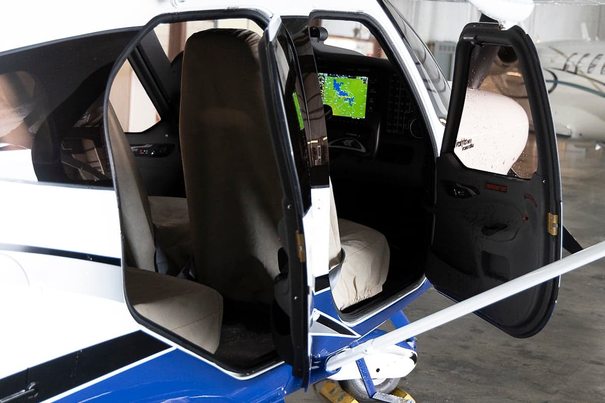 View of the aircraft's interior with open doors.