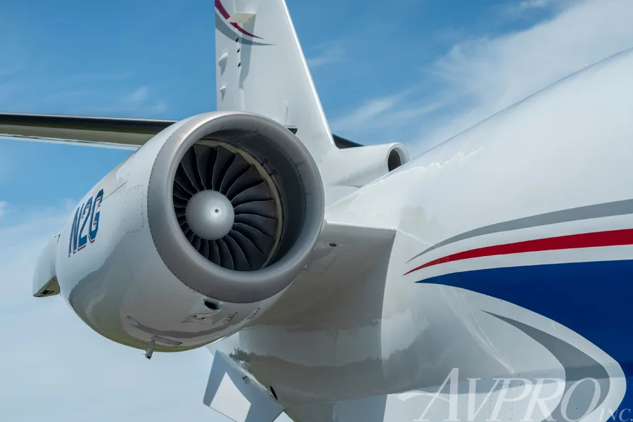A close-up view of the engine and tail section of the Gulfstream G200 business jet, showing N2G registration.