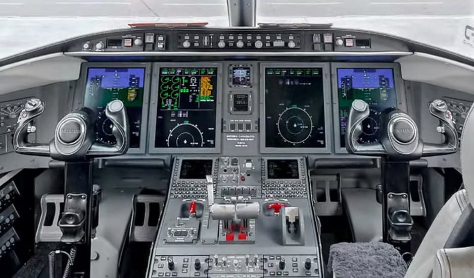 The cockpit features a modern glass panel display.