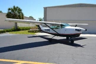 Cessna 206H Stationair with registration N269PB parked on the tarmac.