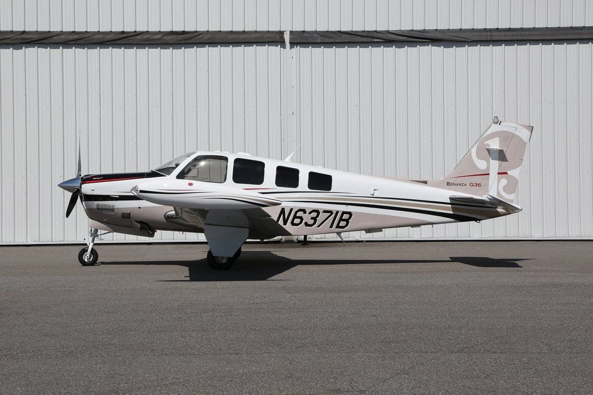 Side view of the Beechcraft Bonanza G36 aircraft with tail number N6371B.