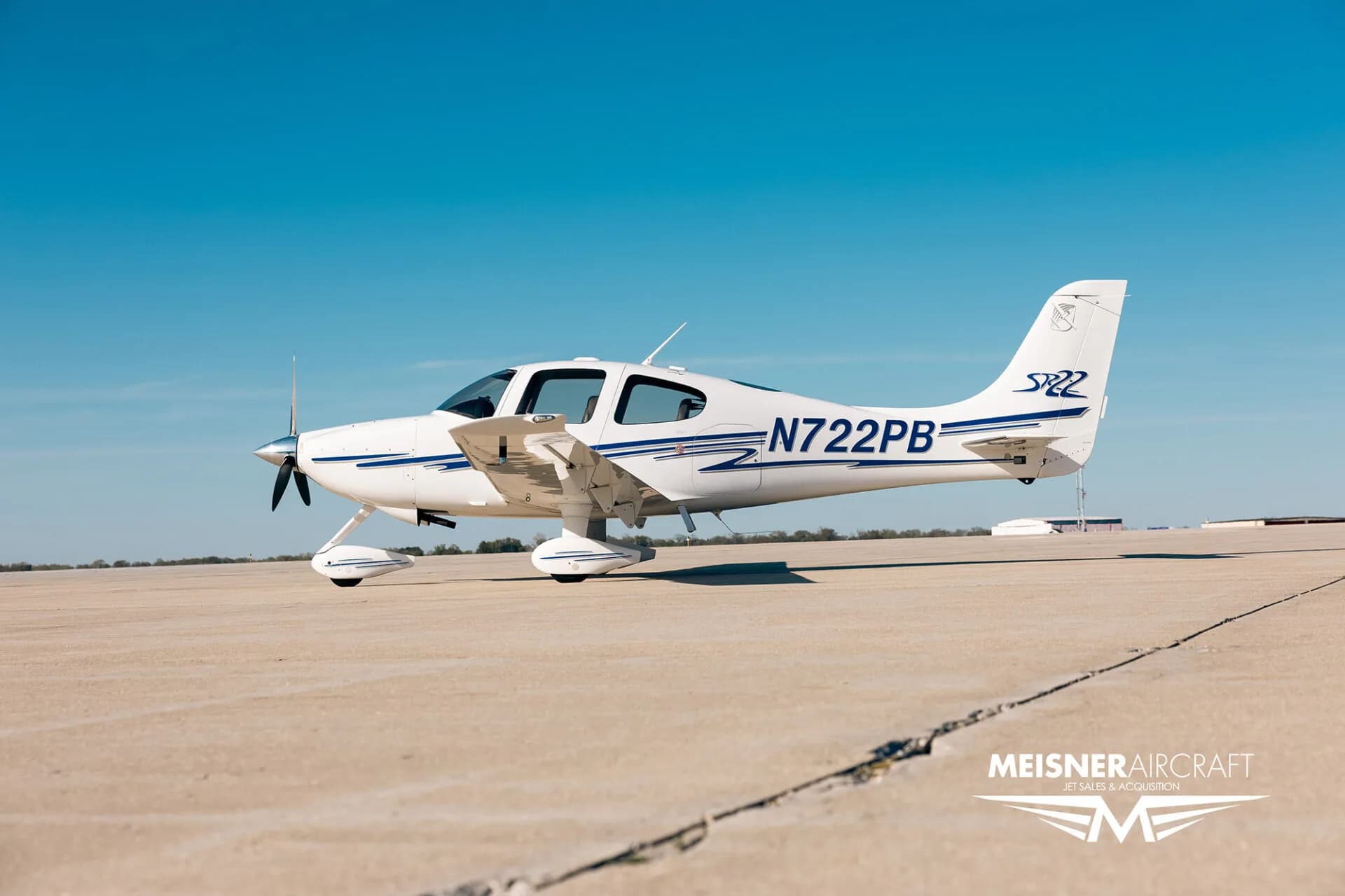 Cirrus SR22 aircraft, registration N722PB, on the ground.
