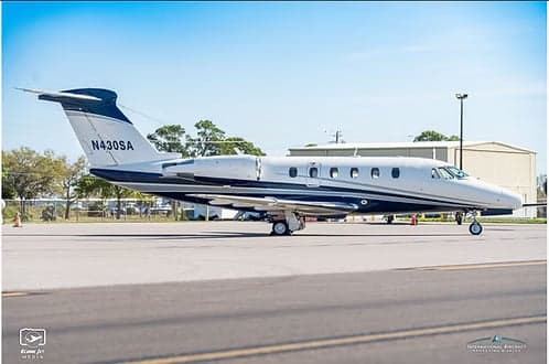 A Cessna Citation CJ3+ aircraft with registration N430SA parked on the tarmac.