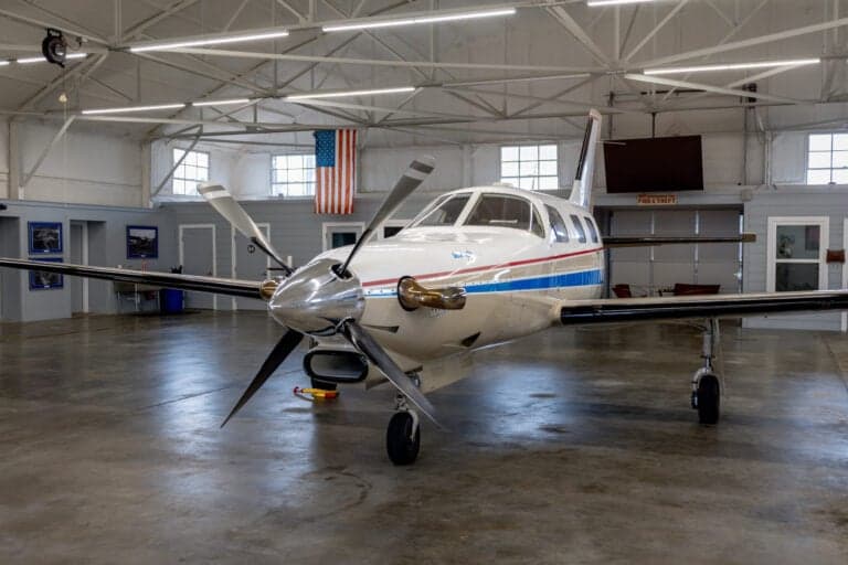 A front view of the N788SM Malibu aircraft in a hangar.