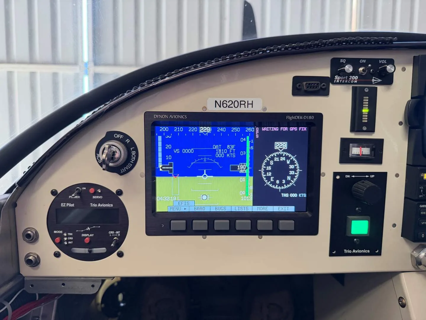 A close-up view of the primary flight display screen in the cockpit, showing flight data.