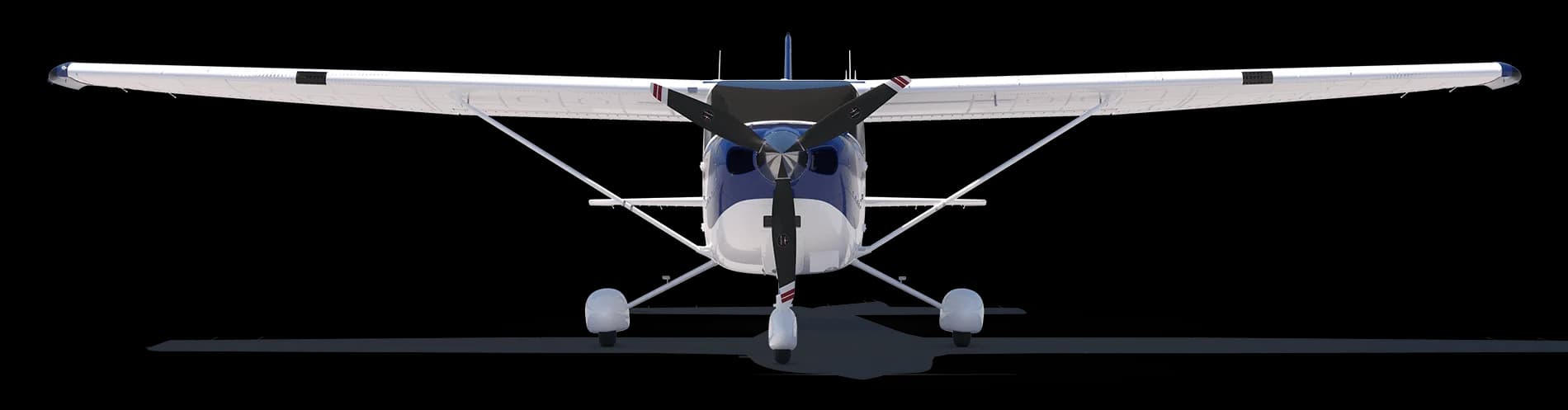 A white and blue Cessna Skylane on a black background, front view.