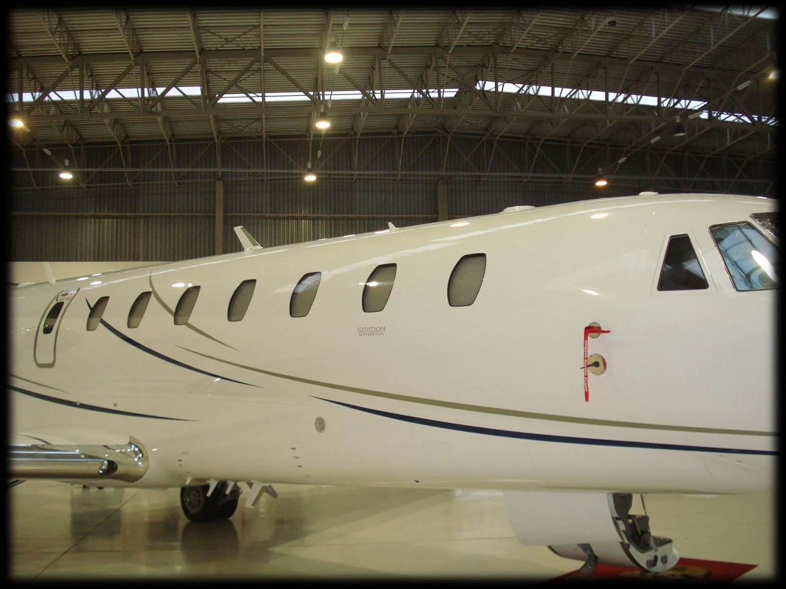 Close up of the side of a Citation Sovereign aircraft.