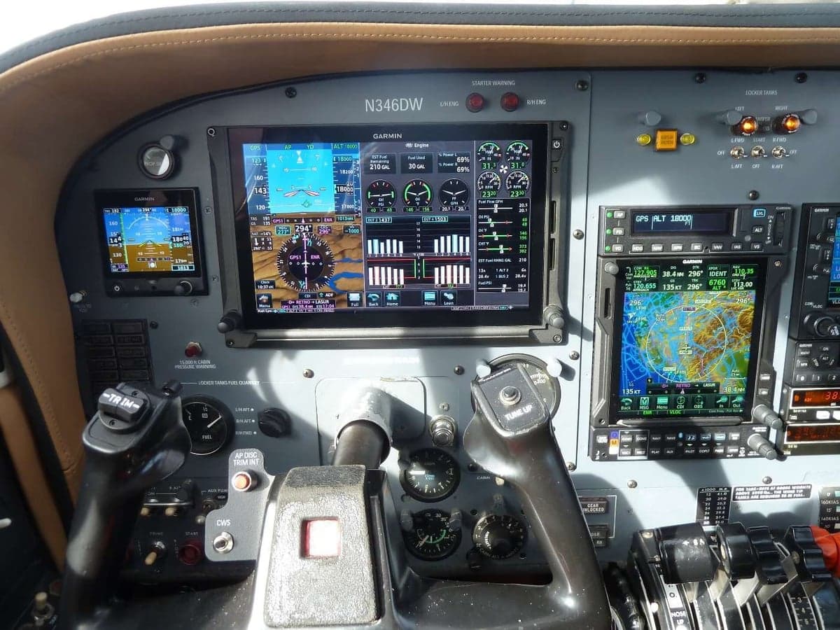 Close-up of the Cessna 414 Chancellor cockpit avionics and controls.