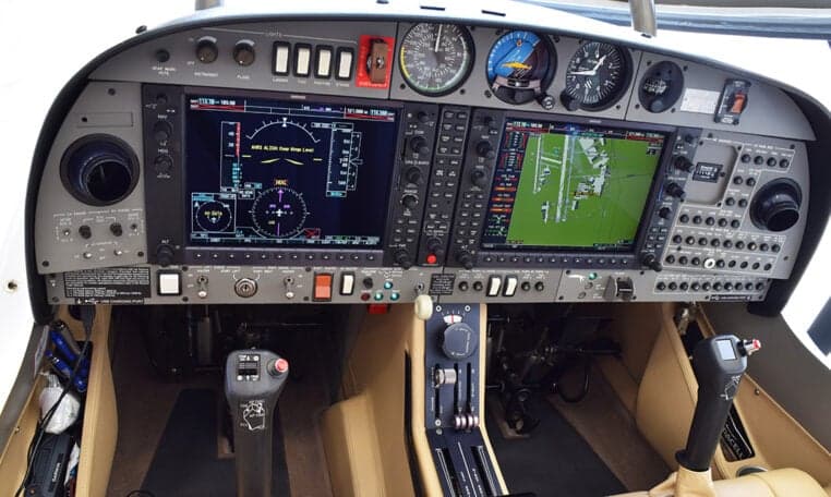 Cockpit view of the Diamond DA62 aircraft with a modern glass panel.