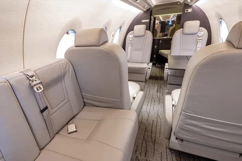 Interior view of the Nextant 400XTi cabin showing the leather seating arrangement.