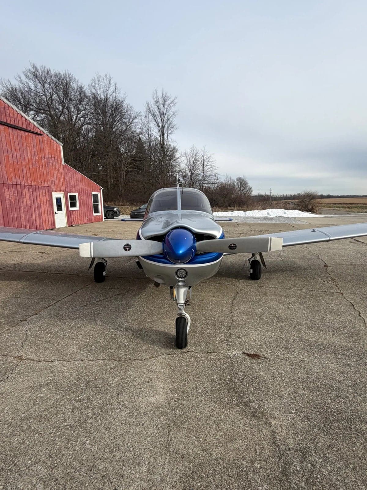 Front view of a Piper PA-28-181 Archer II aircraft with registration N47723 parked on the tarmac.