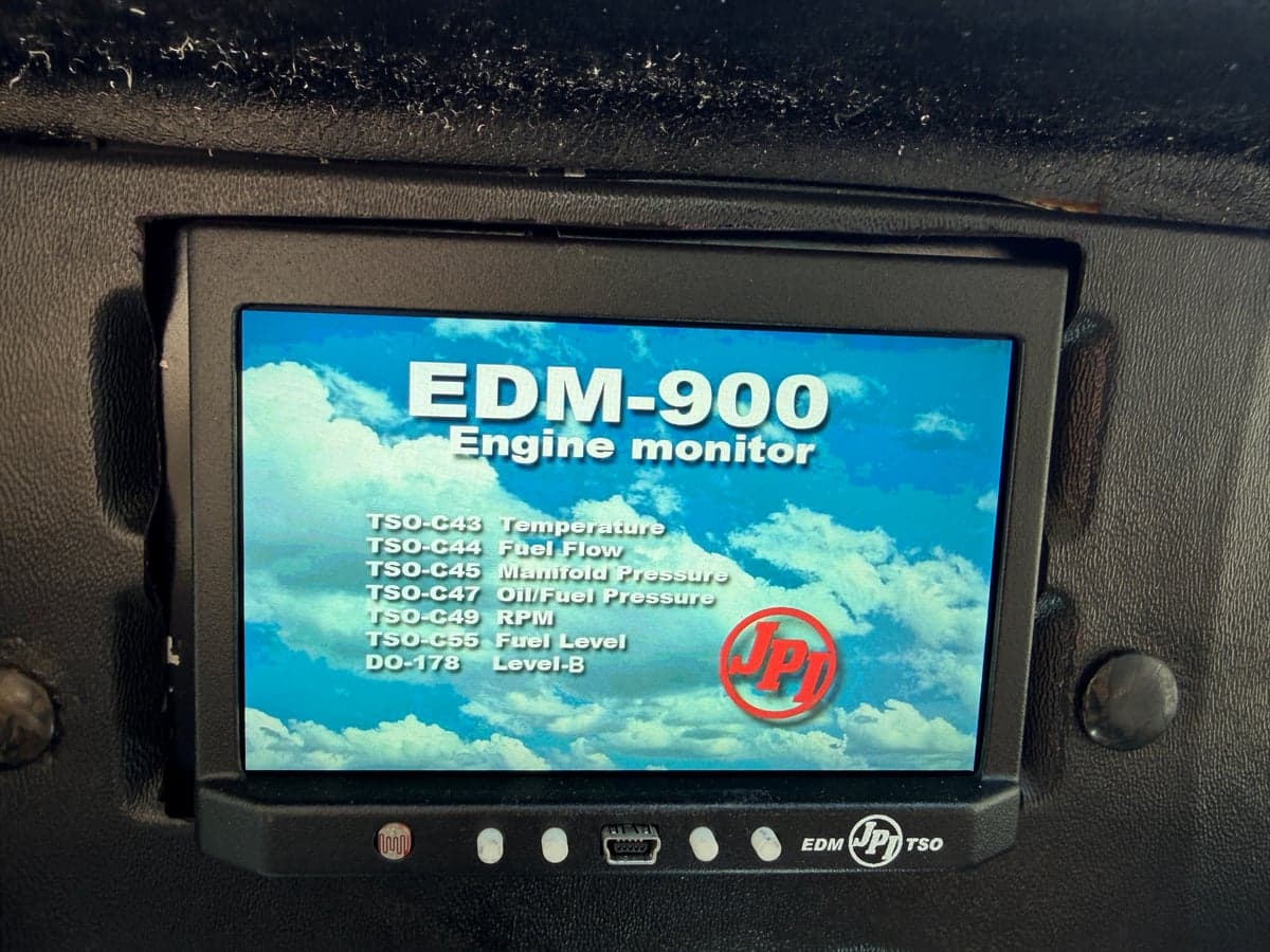 Detailed view of the avionics stack and engine monitoring system in the Skylane's cockpit.