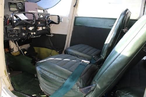 Interior of the aircraft showing the seats and side panel.