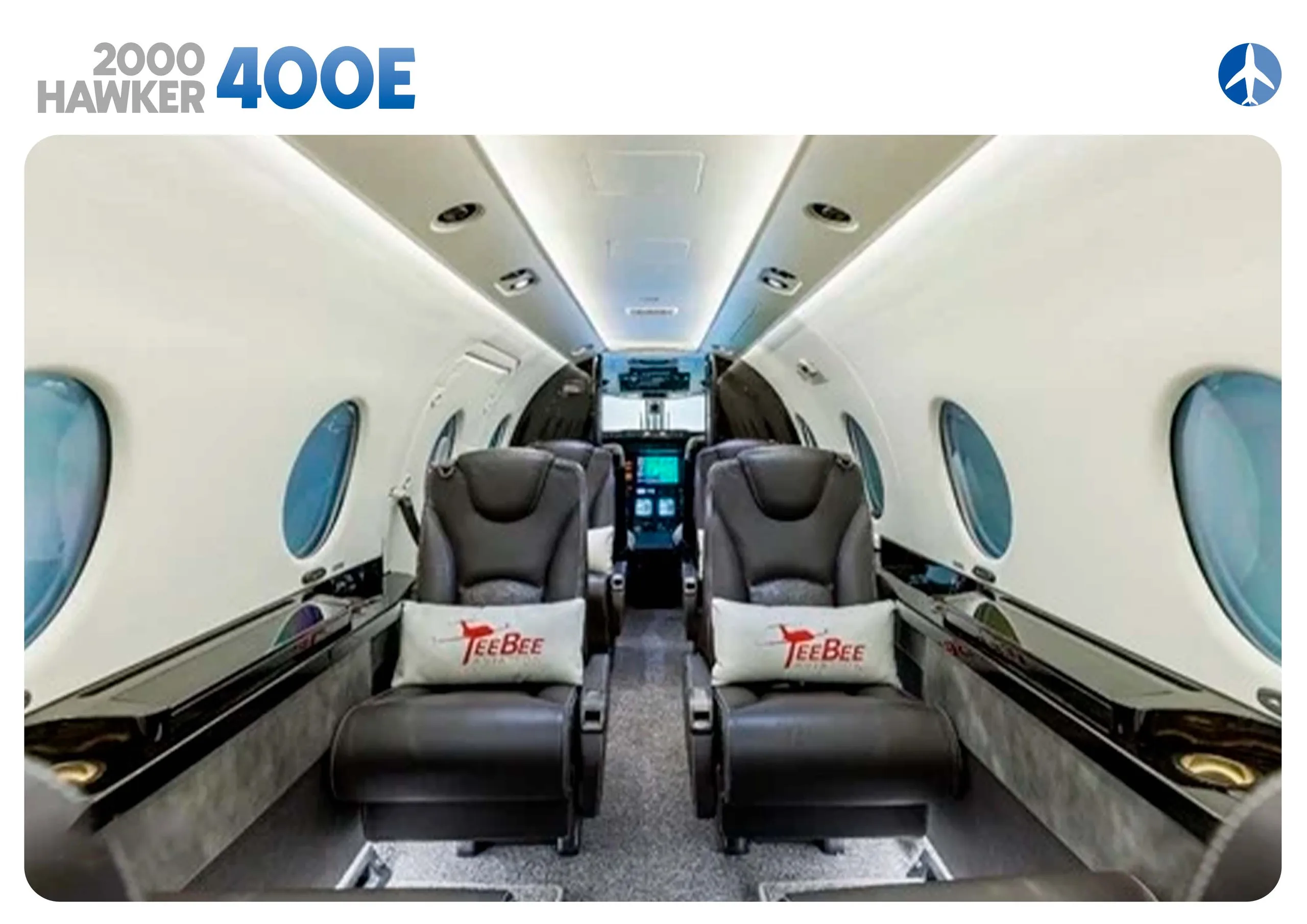 Hawker 400XP cabin interior with leather seats.