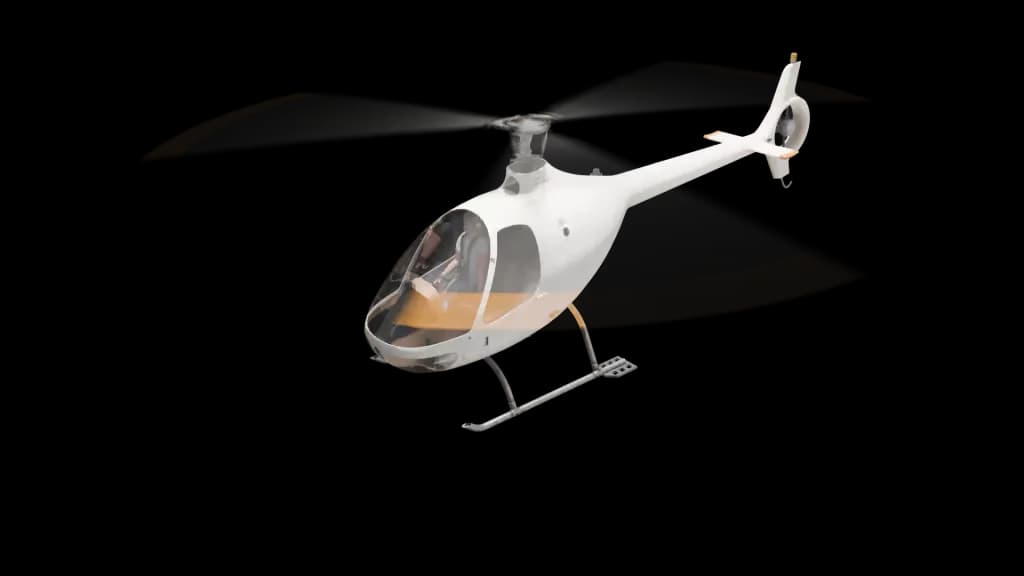 A white helicopter with orange-tipped rotor blades is shown in flight against a plain background.