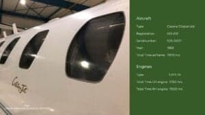 Close up of the Cessna CitationJet OO-IDE windows with text about the aircraft.