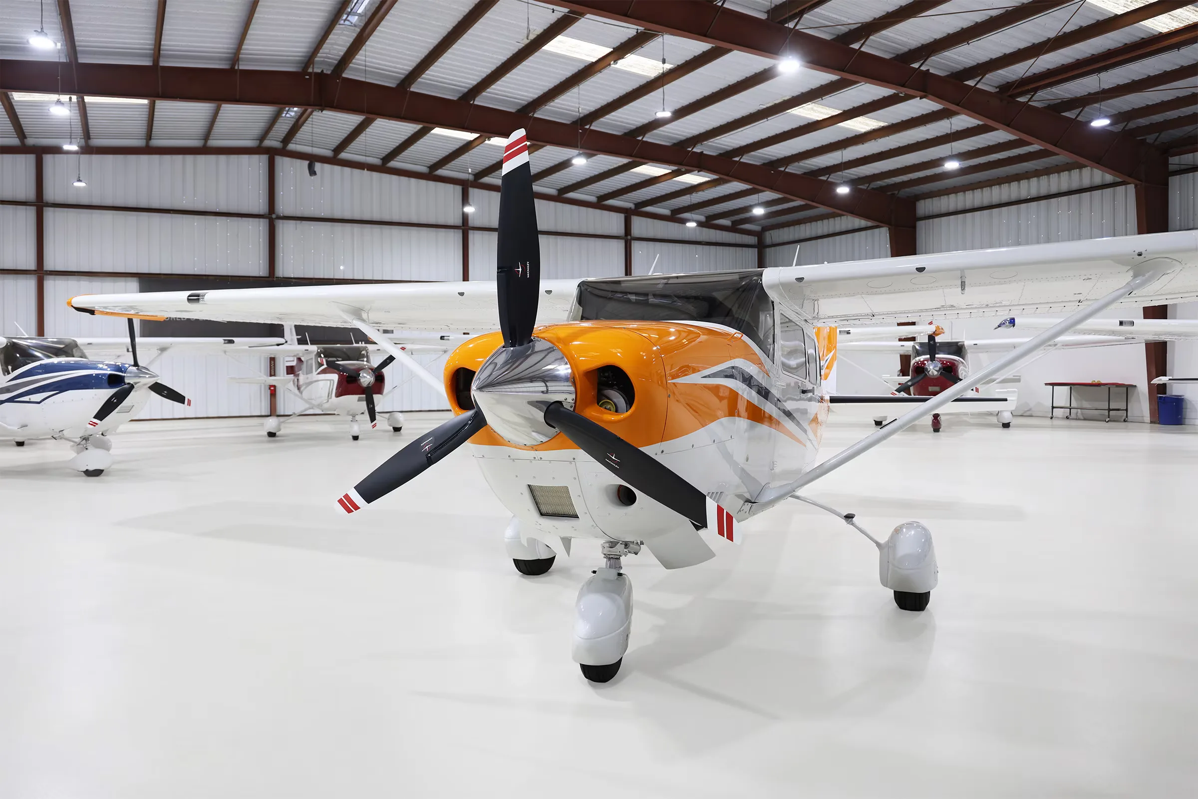 N586JC Cessna Stationair T206H in a hangar, front view.