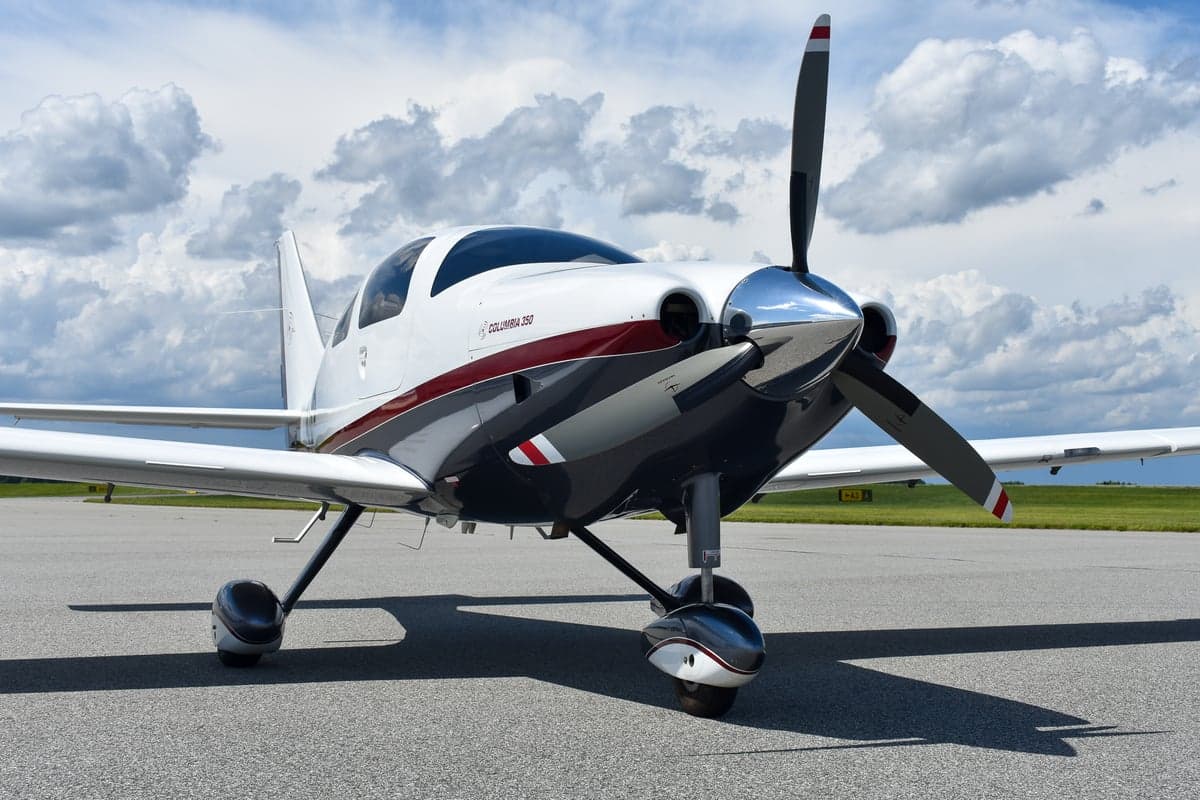 Close up of the propeller and nose of the Columbia 350 aircraft.