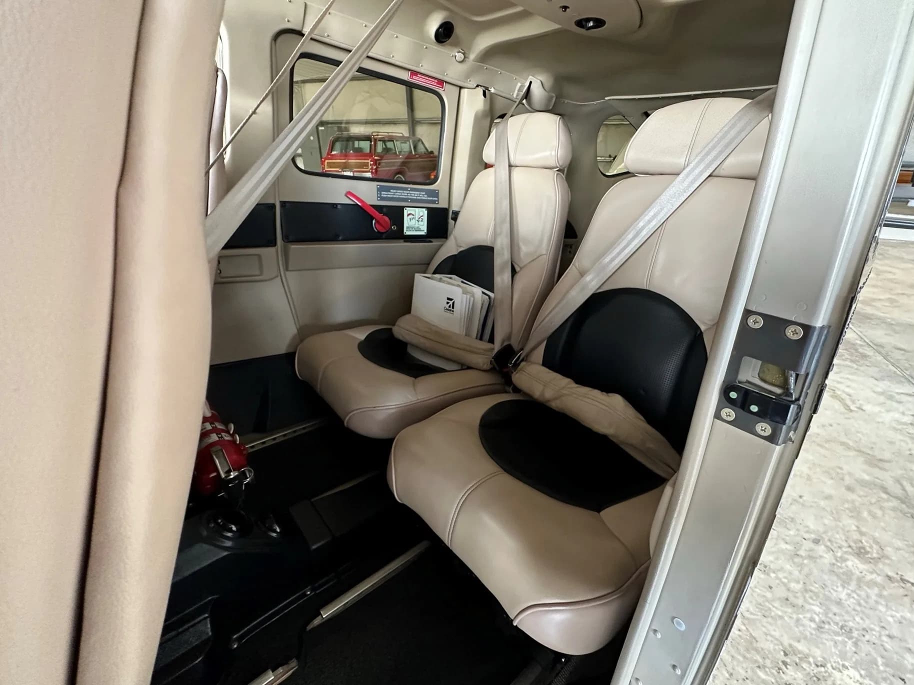Interior view of the Cessna 206 Stationair showing the seating arrangement.