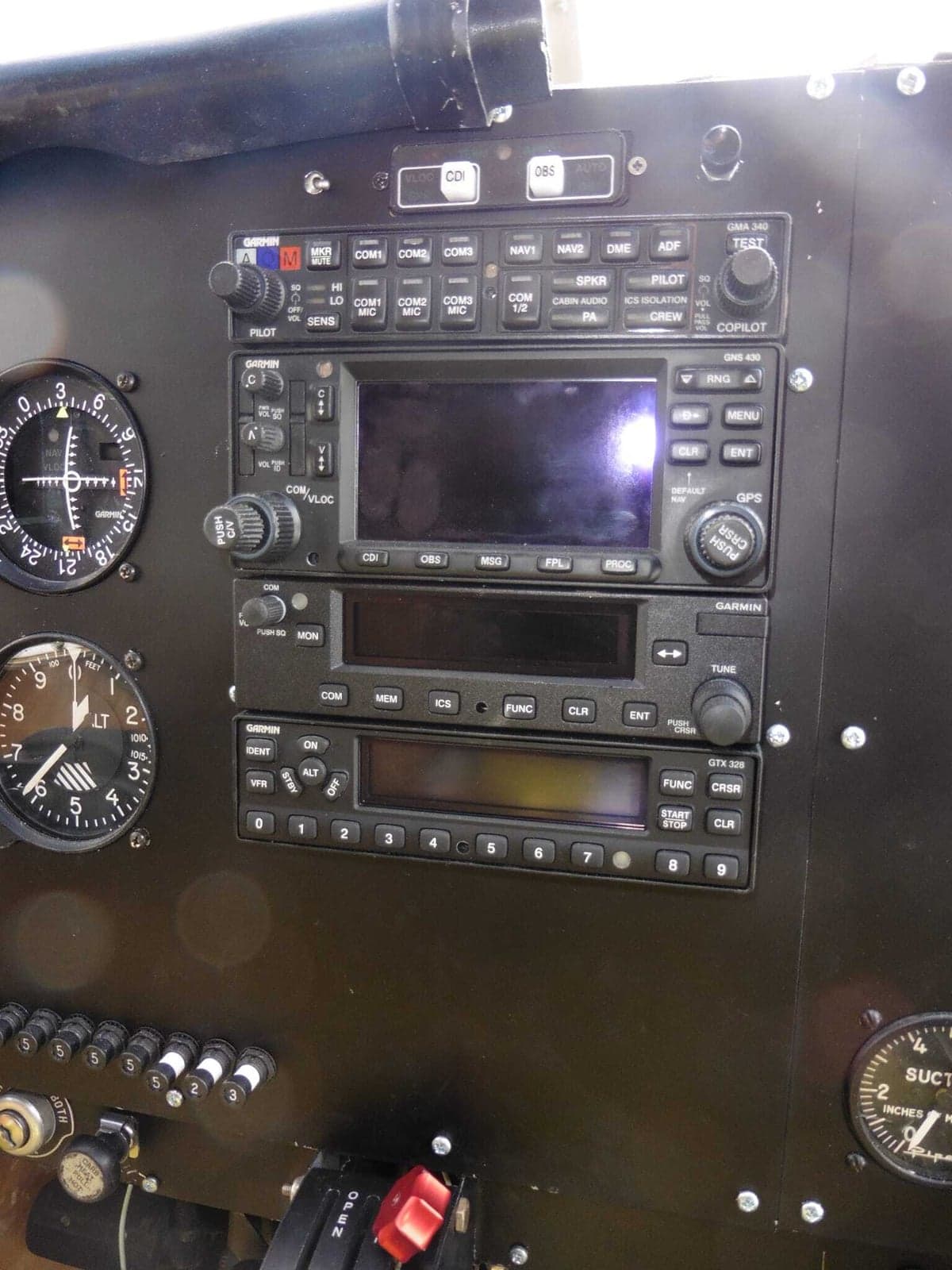 Close-up view of the Garmin avionics stack in an aircraft cockpit.