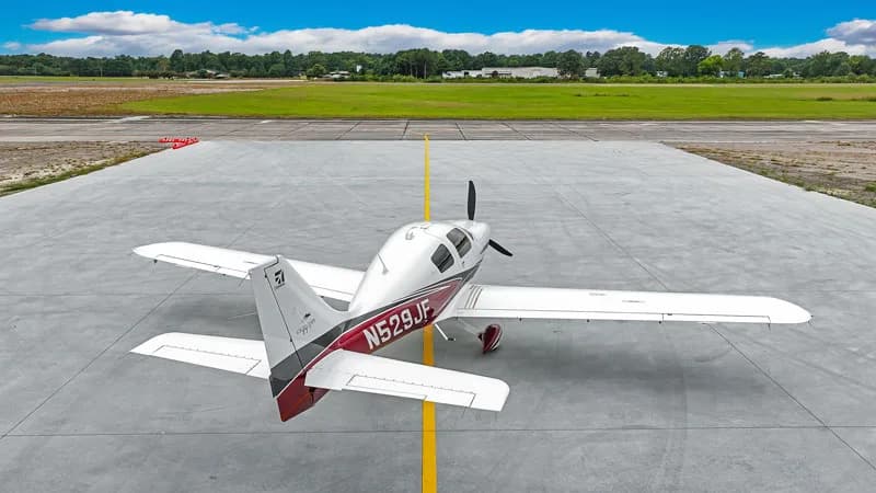 An aerial view of the Cirrus SR22 aircraft N529JF on the tarmac.