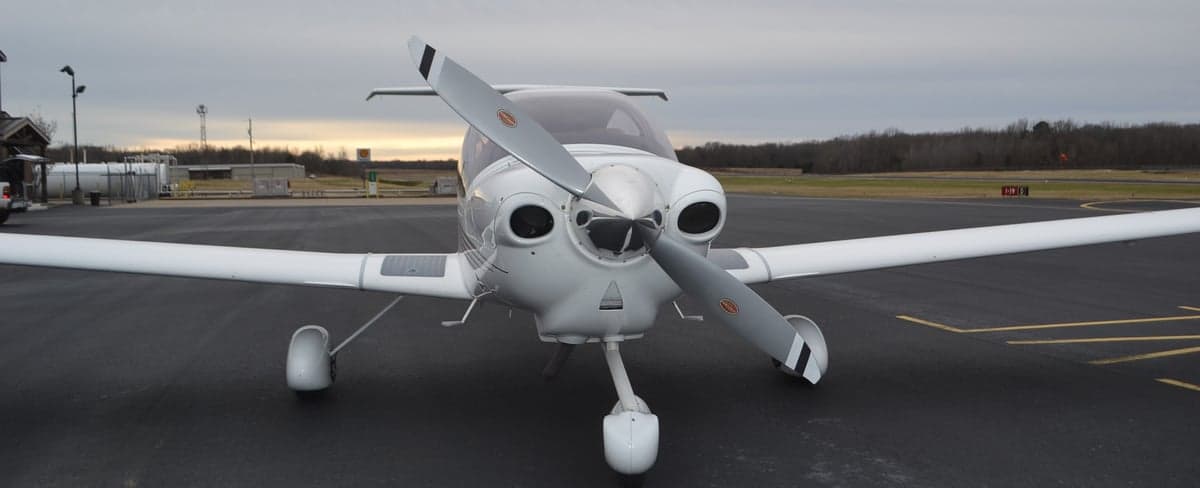 Front view of the Diamond DA40 aircraft on the tarmac.