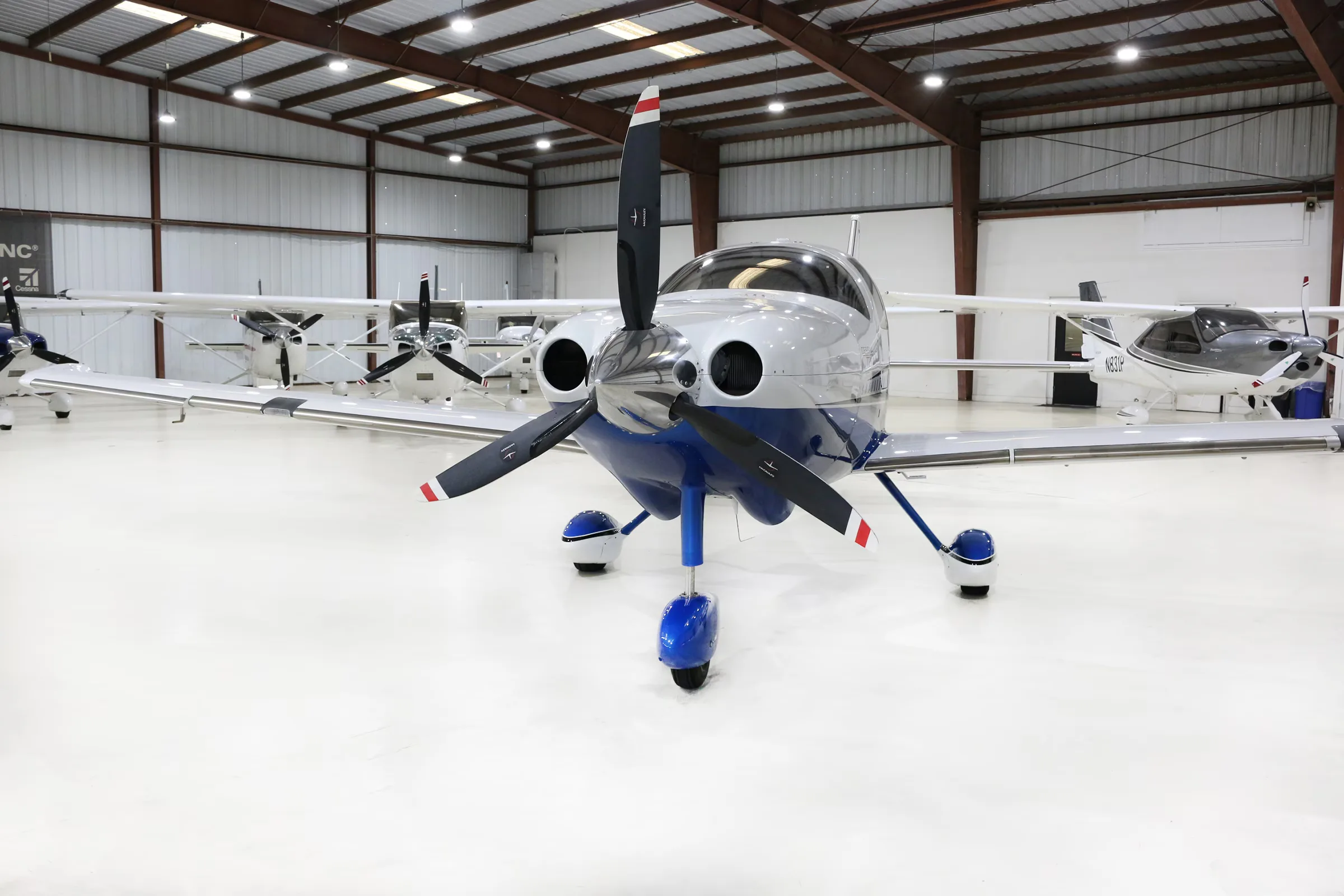 Cessna TTX aircraft N2400G in a hangar, front view.