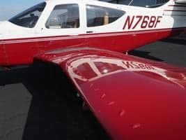 Close up of the wing and fuselage of the N768F aircraft.