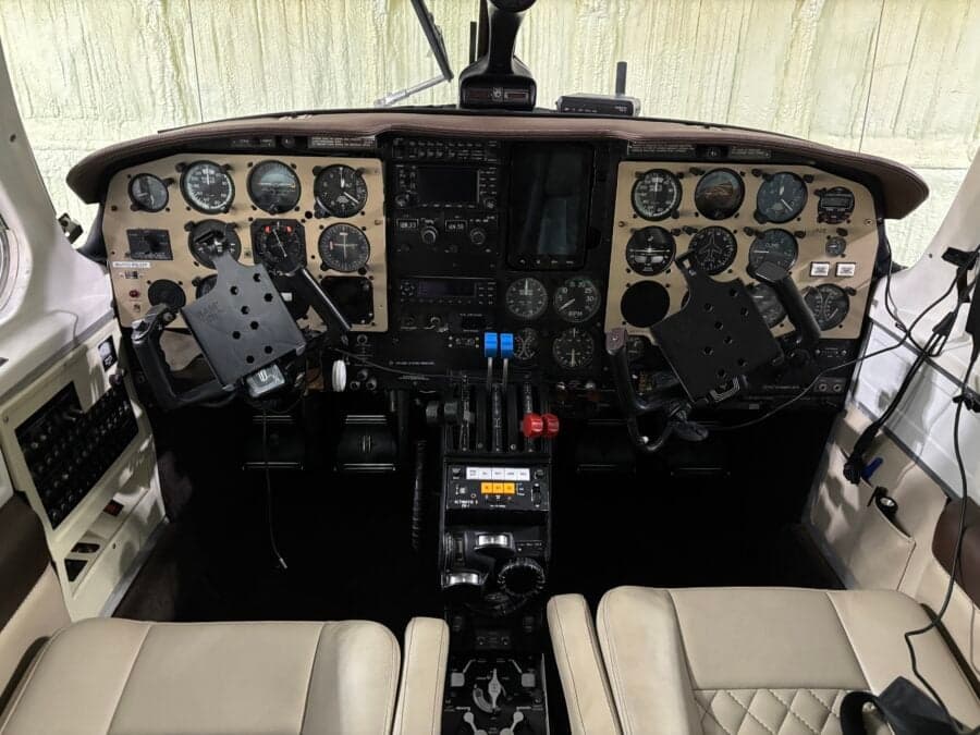 View of the instrument panel and yokes in the cockpit.