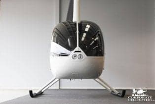 Front view of a Robinson R44 helicopter.