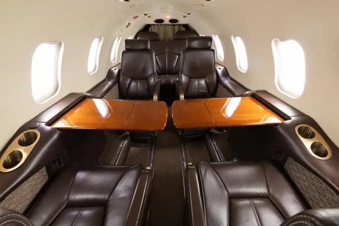 Interior view of the Learjet 45XR cabin with leather seats.