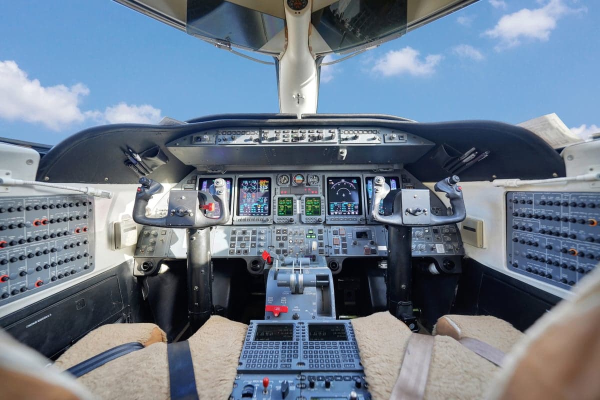 Front view of the Learjet 45XR aircraft N45YF on the tarmac.